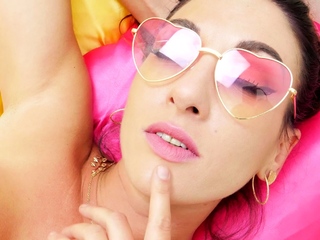 Hot babe plays with big round tits in 4K