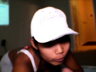 Amateur Asian teen sucks a big cock